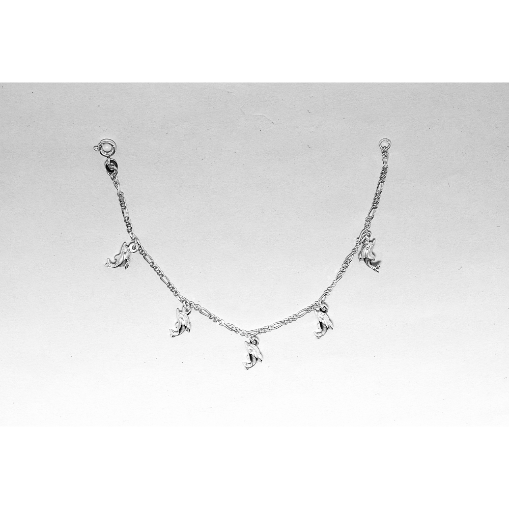 Silver necklace with pendant on a light background