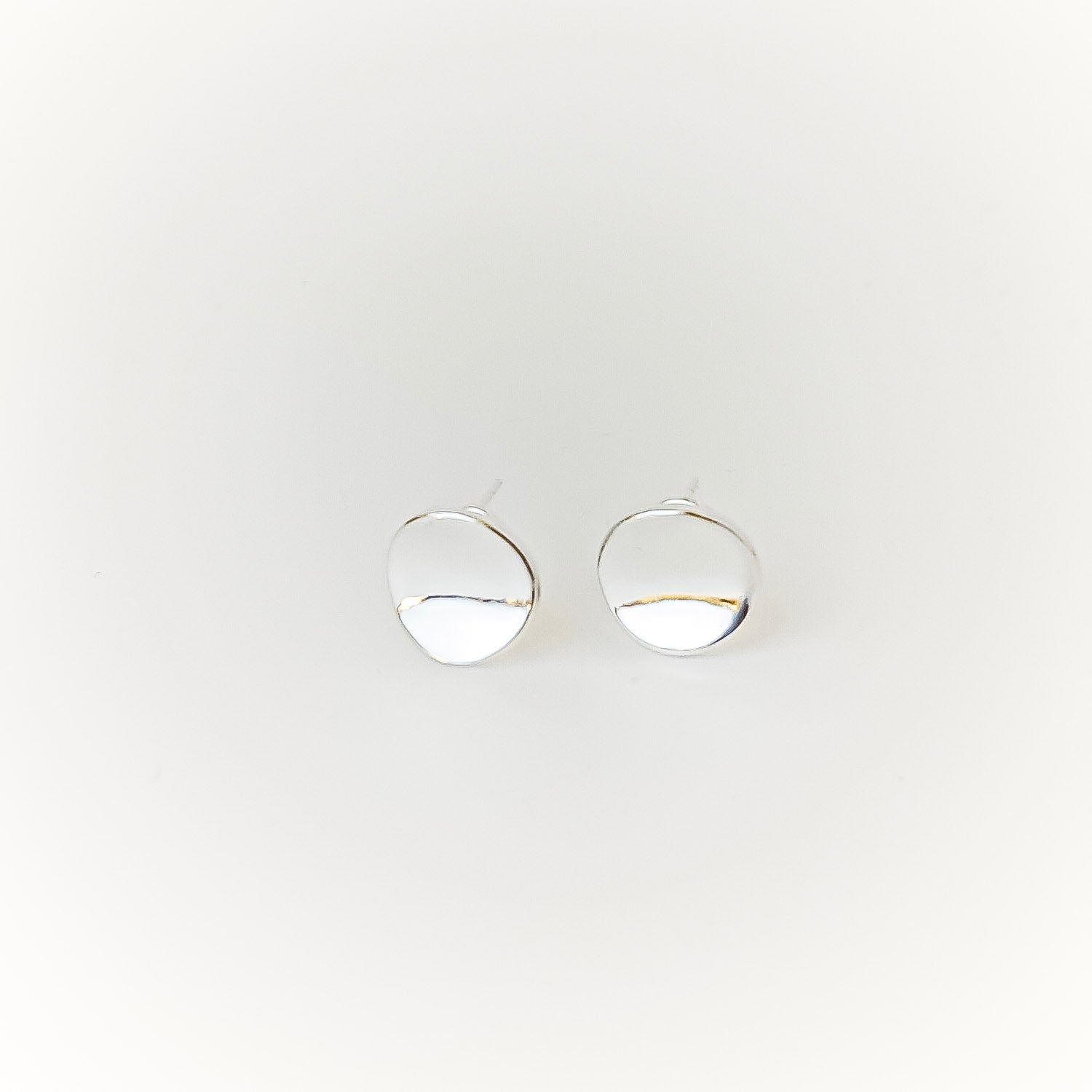 two disc stud earrings