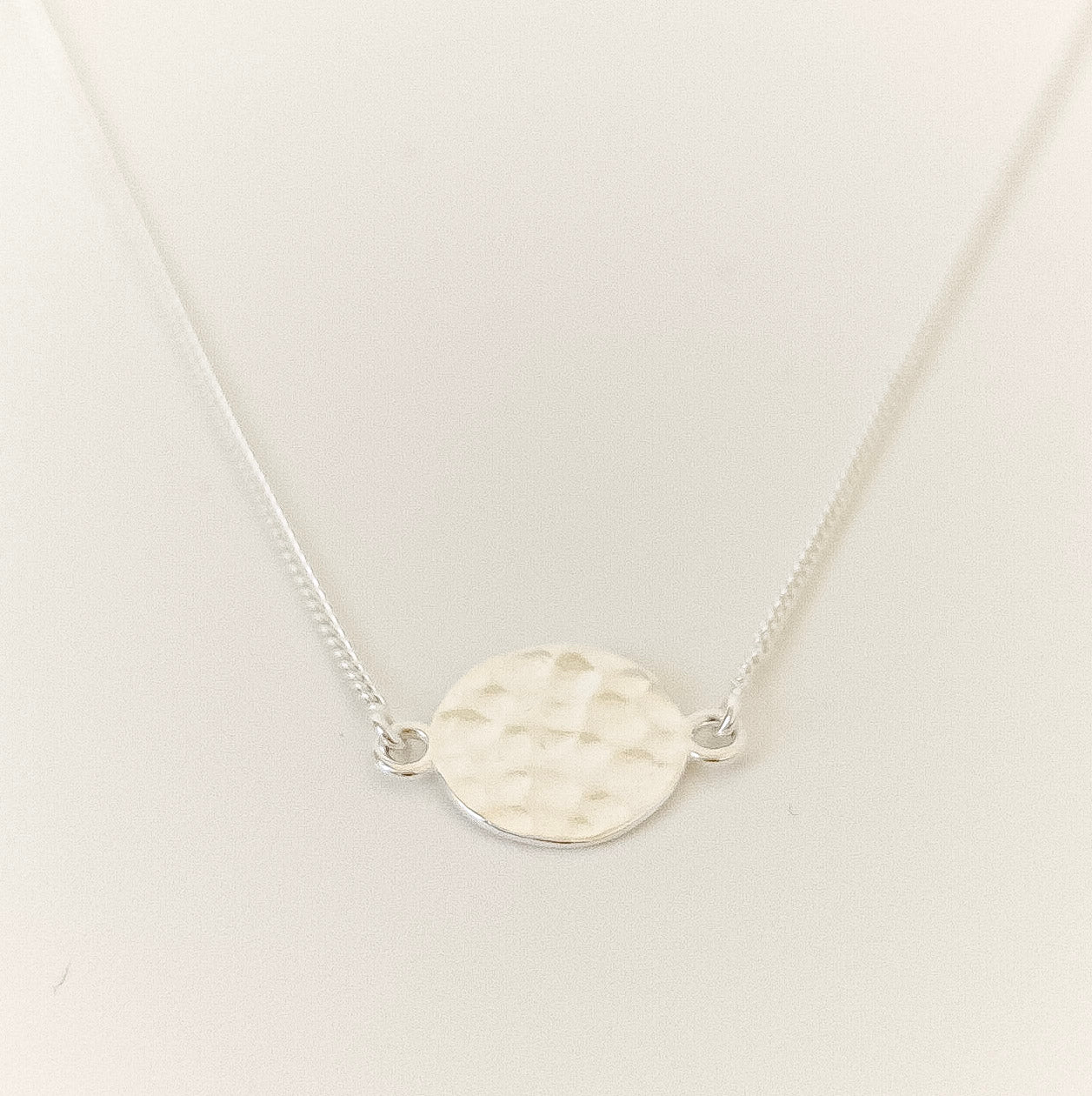 Textured Disc Necklace - sterling silver necklace flatlay