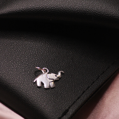 elephant charm on black 