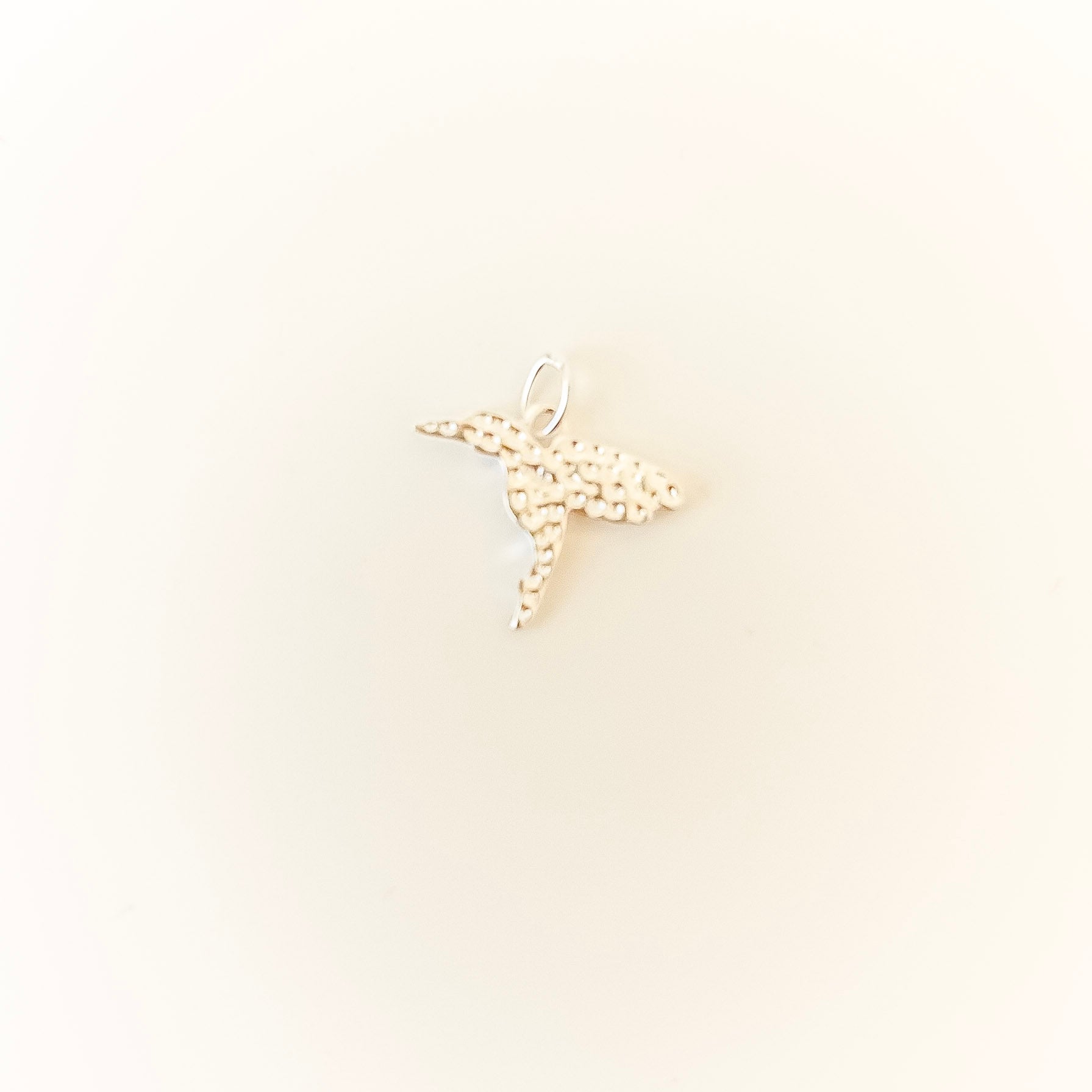 The Hummingbird Charm lifestyle - sterling silver charm OJA Silver