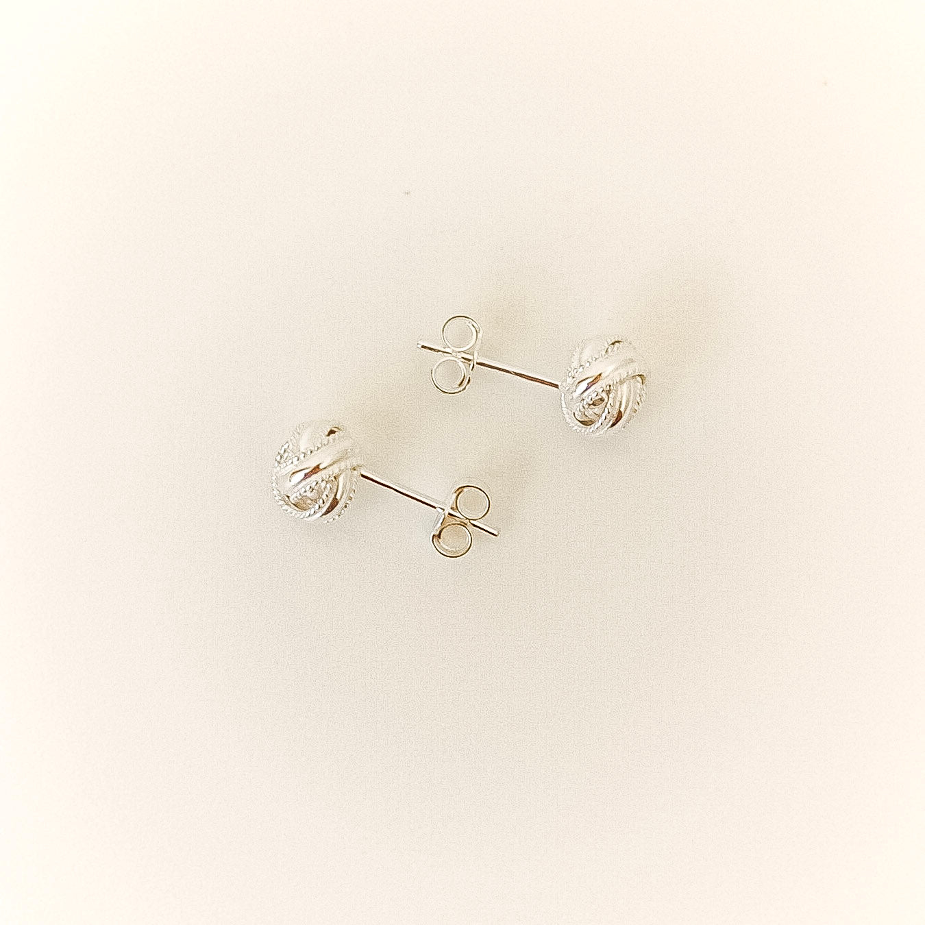 Woven Stud Earrings - sterling silver earring flatlay