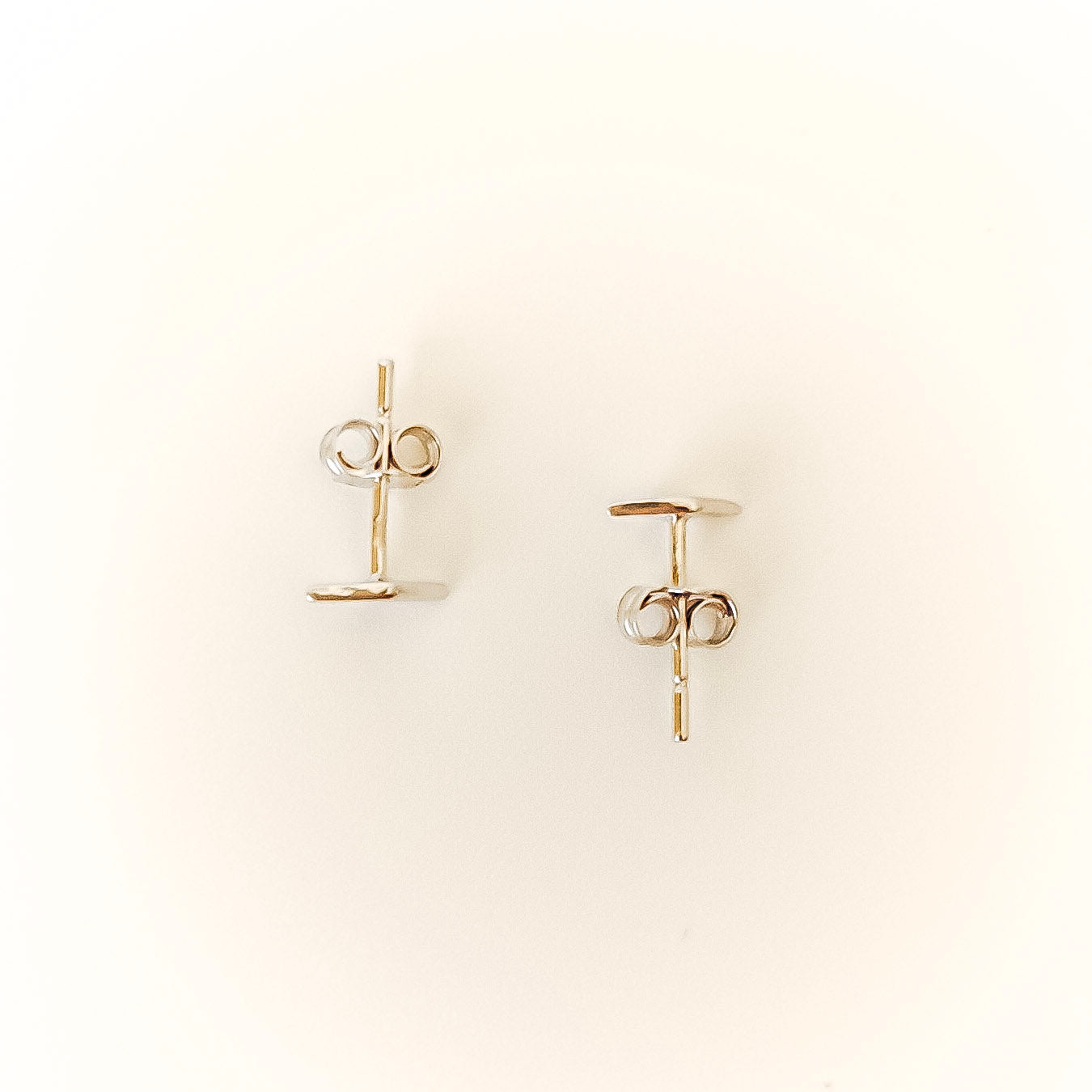 Diamond Stud Earrings - sterling silver earring flatlay