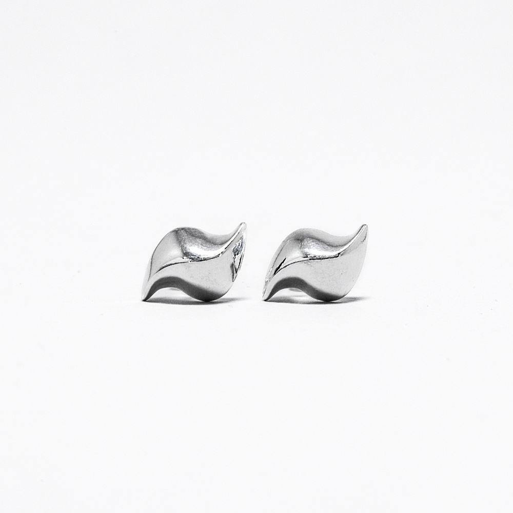 Pair of silver studs on a white background