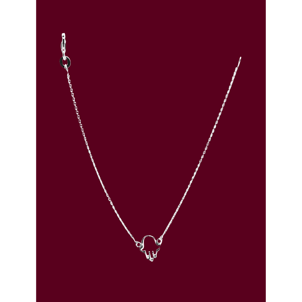 Silver bracelet with a hand-shaped pendant on a red background