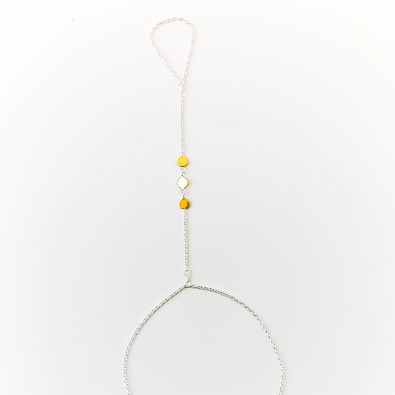 Necklace with yellow beads on a white background