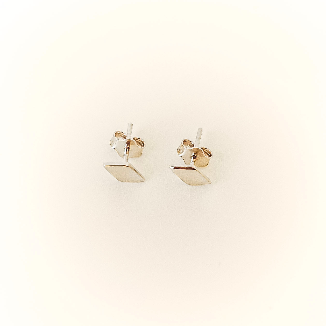 Diamond Stud Earrings - 925 silver earring on skin
