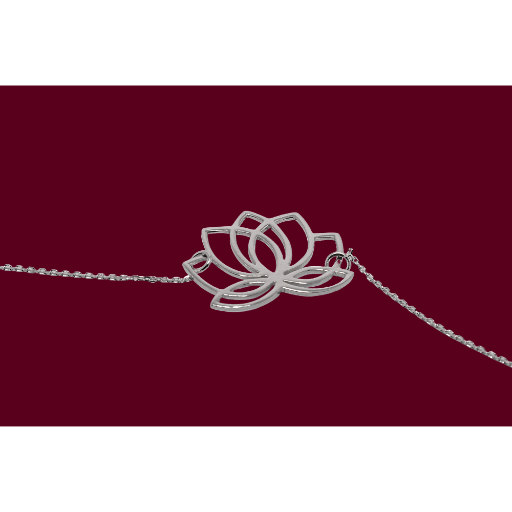 Silver lotus flower bracelet on a red background