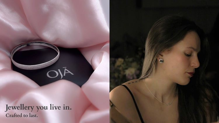 brushed silver bracelet on satin cloth 